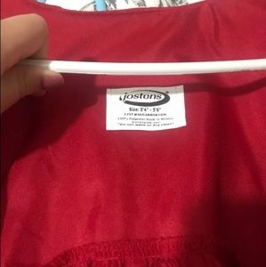 Red Jostens cap and gown
